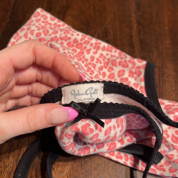 Brandy Melville pink leopard print tank top with a little bow on the top. - Picture 3 of 4